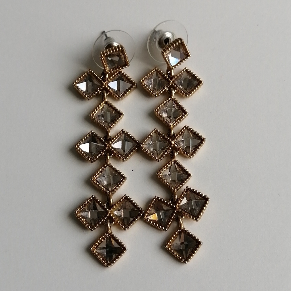 Gold tone crystal long earrings